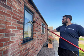 cleaning-a-window-in-woodhall-spa-lincolnshire