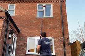 cleaning-a-window-with-pure-water-in-woodhall-spa-lincolnshire